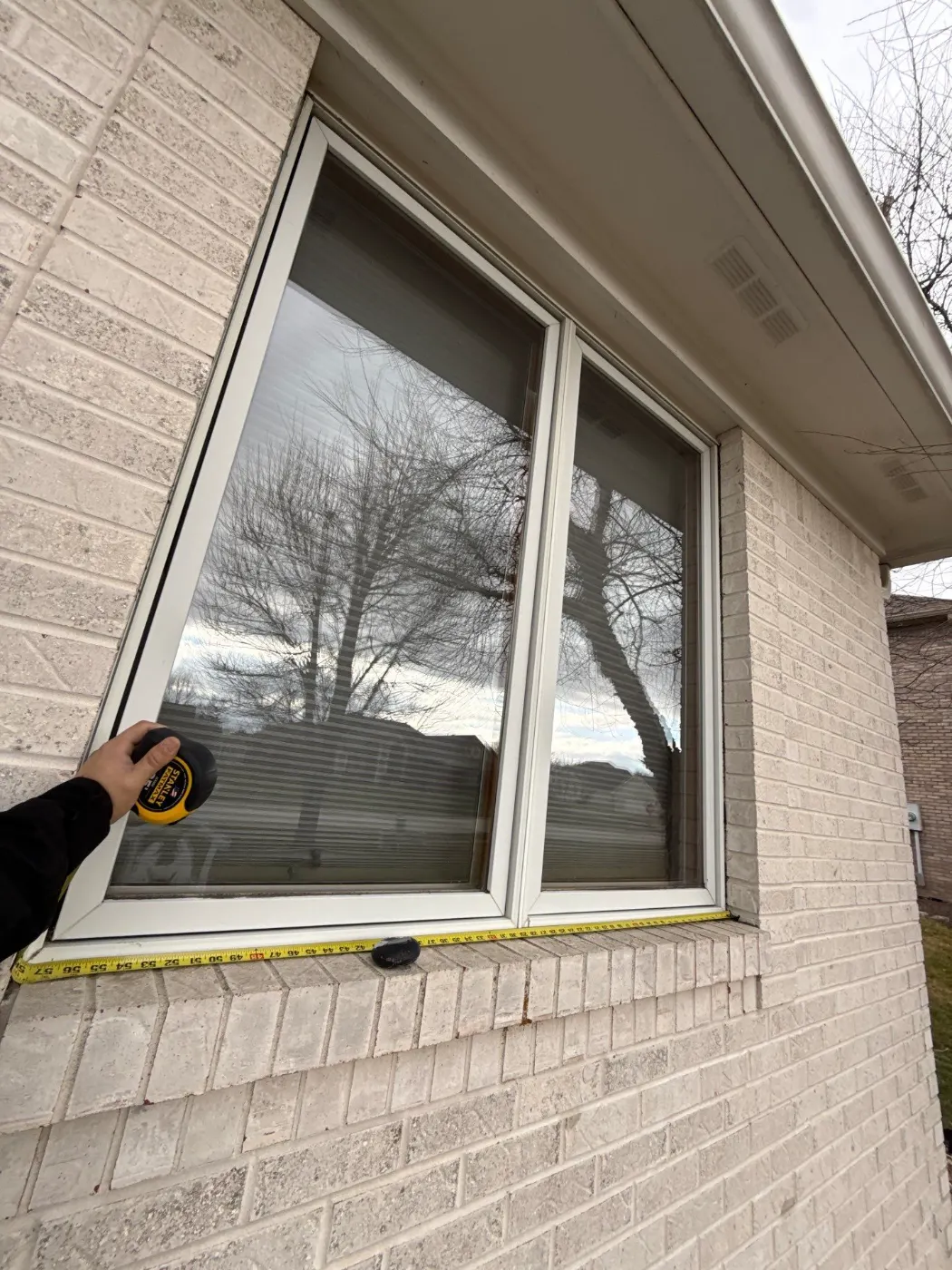 Window replacement documented in Elwood